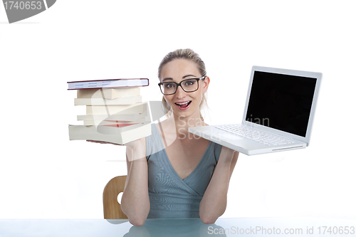 Image of young successful business woman in the office