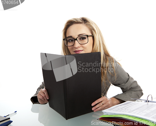 Image of young successful business woman in the office