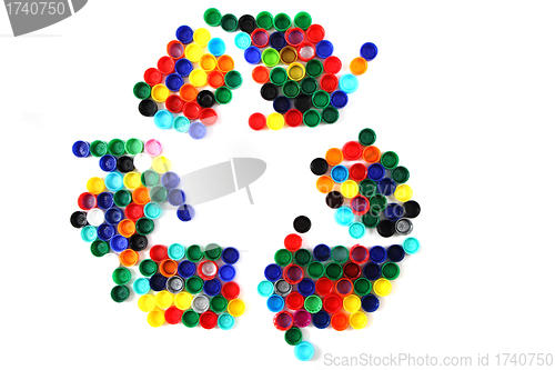 Image of symbol recycle from color plastic caps