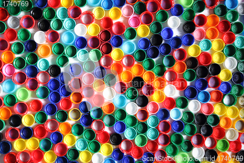 Image of color plastic caps background