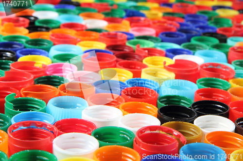 Image of color plastic caps background