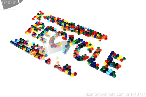 Image of word recycle from color plastic caps