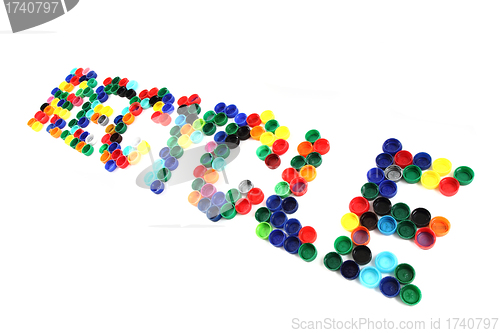 Image of word recycle from color plastic caps