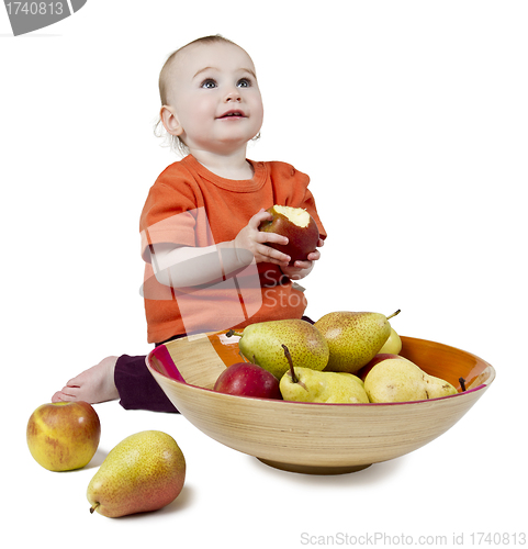 Image of baby with apples