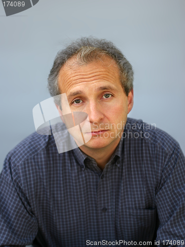 Image of Unhappy businessman
