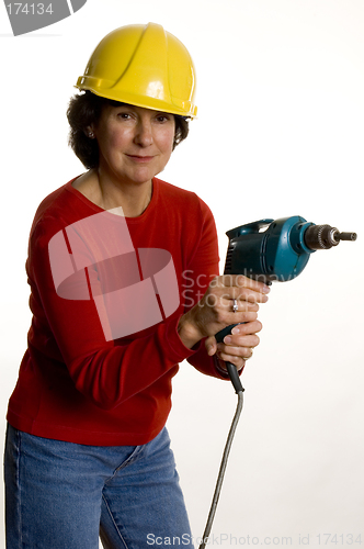 Image of woman with electric drill