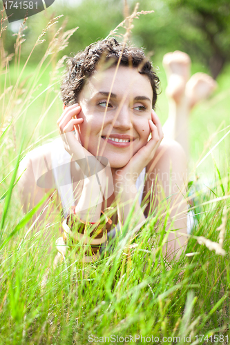 Image of girl on green field 