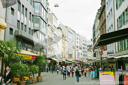 Image of BASEL - MAY 3: People walk by at the main street in Basel May 3,
