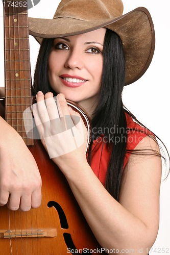 Image of Female musician with her guitar