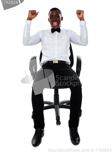 Image of Excited successful business male