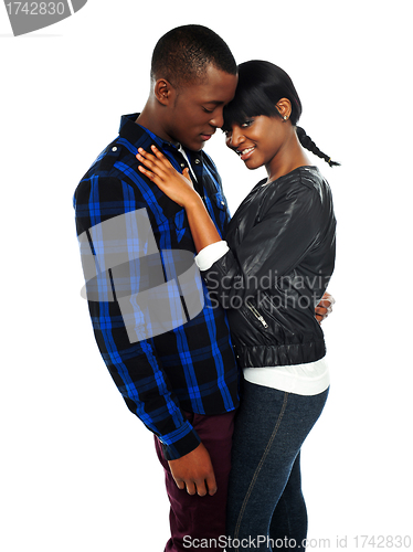 Image of Attractive african couple posing together