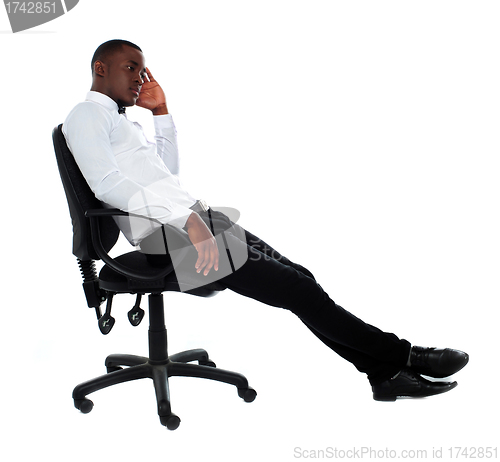Image of Portrait of thoughtful young businessman