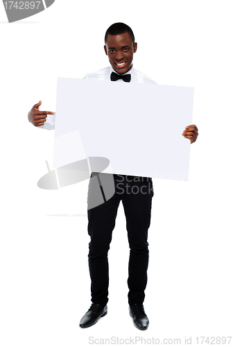 Image of Guy indicating towards blank whiteboard