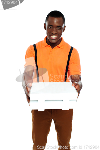 Image of Pizza boy delivering an order