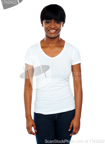 Image of Happy young african woman standing