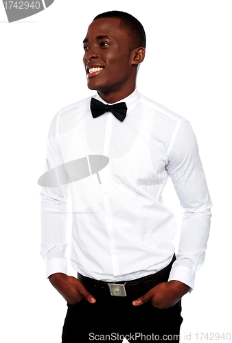 Image of Smiling young african boy looking away