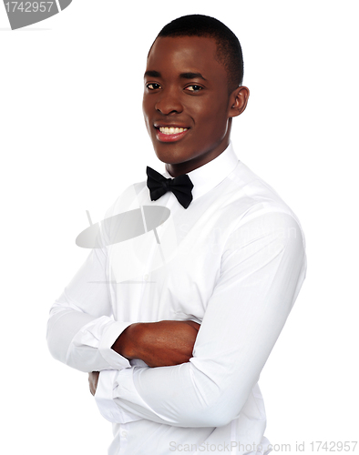 Image of African gentleman posing with crossed arms