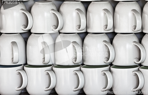 Image of Ceramic cups on market stall