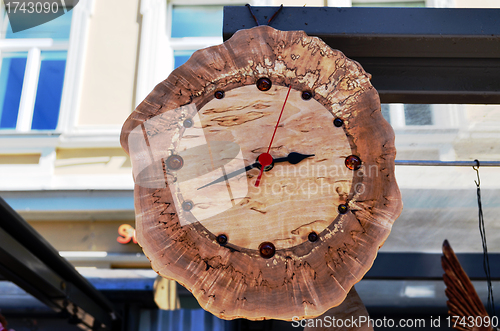 Image of Handmade wooden clock decorated with amber stones 