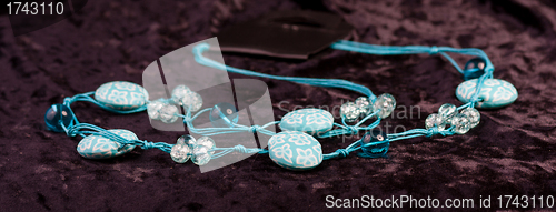 Image of blue beads on a string