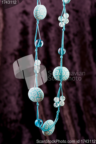 Image of blue beads on a string