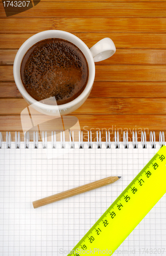 Image of notebook pencil line and coffee