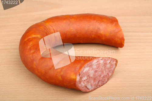 Image of smoked sausage in natural casing