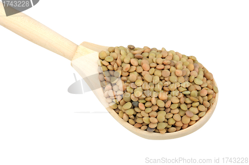 Image of lentils in wooden spoon