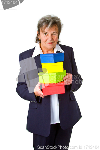 Image of Female senior with gift boxes 