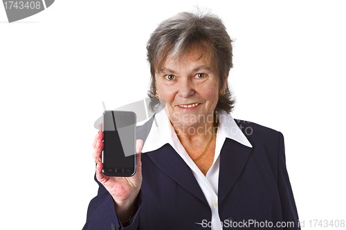 Image of Successful female senior with cellphone