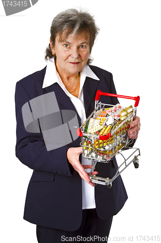 Image of Female senior with pills