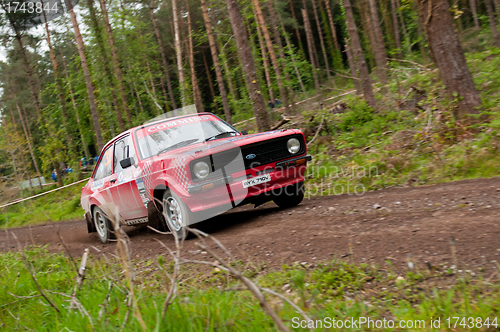 Image of A. Commins driving Ford Escort