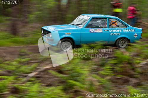Image of L. Lynch driving Ford Escort