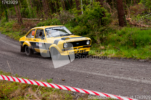 Image of J. Deane driving Ford Escort