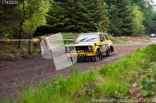 Image of J. Deane driving Ford Escort