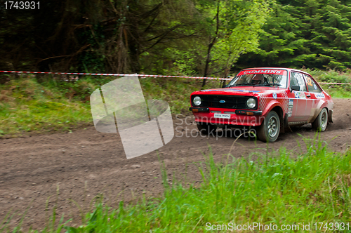 Image of A. Commins driving Ford Escort