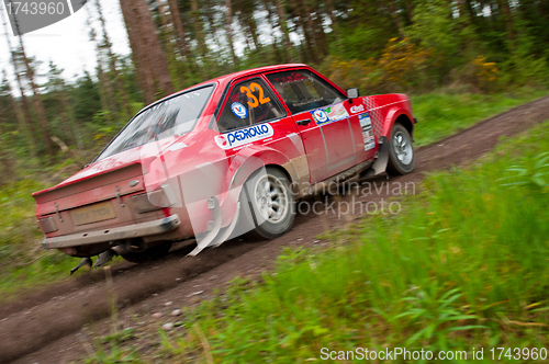 Image of A. Commins driving Ford Escort