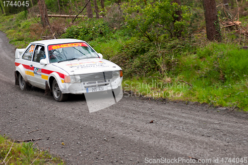 Image of M. Sheedy driving Ford Escort