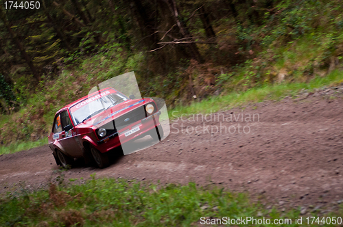 Image of A. Commins driving Ford Escort