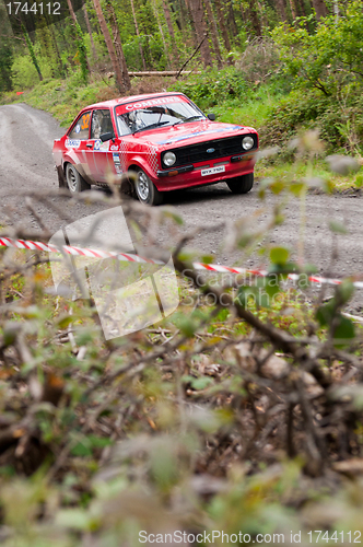 Image of A. Commins driving Ford Escort
