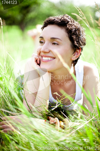 Image of girl on green field 