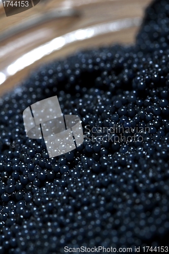 Image of glass with caviar 