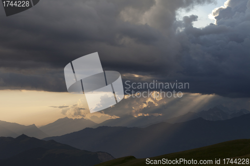 Image of Silhouettes of mountains in clouds