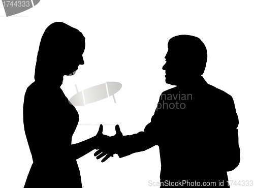 Image of Silhouette of the man shaking hand to young woman