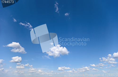 Image of Summer sky with small clouds