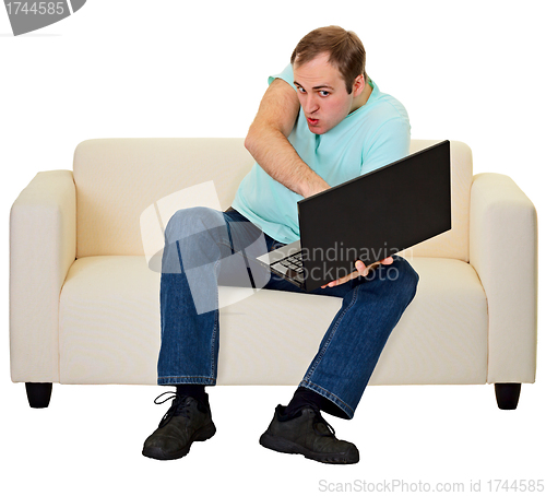 Image of Funny guy plays with a laptop