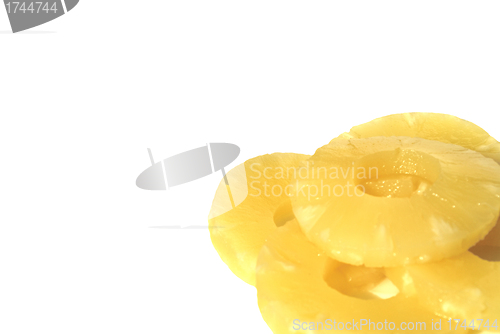 Image of yellow canned pineapple rings, vegetarian food  