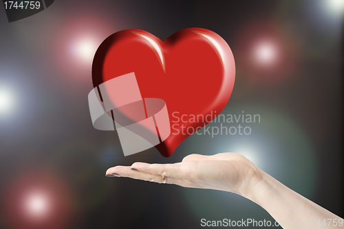 Image of hands holding heart, love or medical concept 