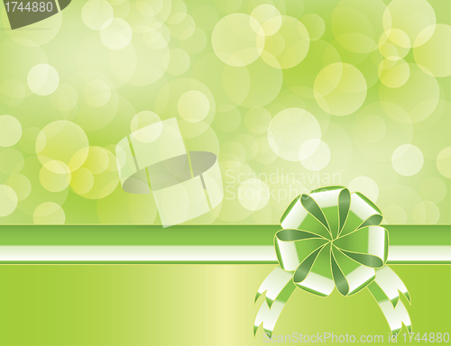 Image of Green background with bow   and blurry light  