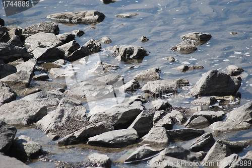 Image of Water and stones riverside or seaside – nature background